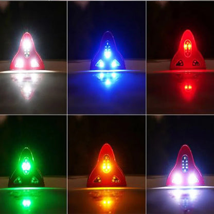 Night view of car with LED shark antenna on top