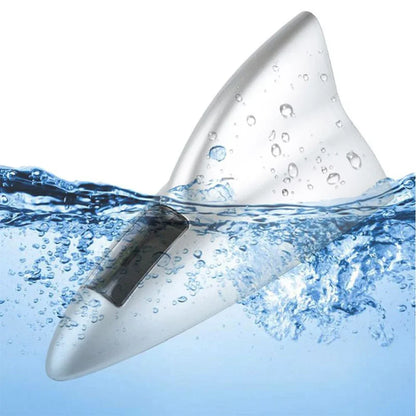 Close-up of shark fin antenna with glowing LED